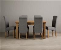 Extending Buxton 140cm Solid Oak Dining Table with 6 Grey Scroll Back Chairs