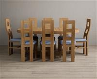 Extending Helmsley Oak Pedestal Dining Table with 4 Light Grey Natural Chairs