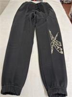Reebok Cuffed Black Joggers With Graphic On Leg