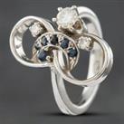 Pre-Owned 14ct White Gold Diamond & Brilliant Cut Sapphire Swirl Dress Ring 41481047