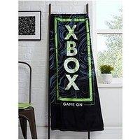 Xbox X Box Game On Towel