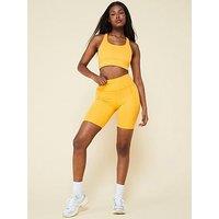 Girlfriend Collective Women'S Training Compressive High-Rise Bike Shorts - Yellow