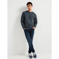 Tommy Jeans Austin Slim Fit Tapered Jeans - Mid Wash