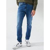 Tommy Jeans Austin Tapered Fit Stretch Jeans - Mid Wash