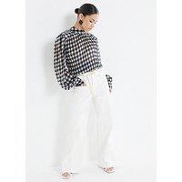 Ri Petite High Rise Relaxed Flared Jeans - White