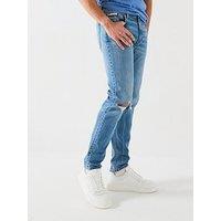 Calvin Klein Jeans Rip & Repair Slim Taper Jeans - Mid Wash