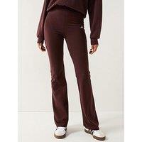 Adidas Sportswear Women'S Essentials Small Logo Flared Leggings - Brown