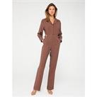 Fig & Basil Contrast Stitch Long Sleeve Tapered Jumpsuit