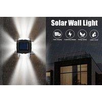 Set Of 4 Solar-Powered Wall Lamps