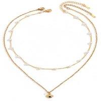 Elegant Blue Eye And Pearl Necklace Set In Gleaming Gold