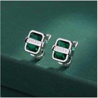 Sterling Silver Lucky Emerald Huggies Earrings with Cubic Zirconia