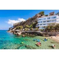 All-Inclusive Majorca Holiday: Return Flights & Poolside Relaxation