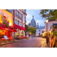 Twin City Amsterdam & Paris Getaway with Hotels, Flights, and Transfers Included