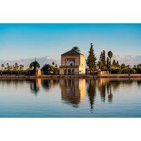 4* Moroccan Stay with Agafay Desert Glamping, Breakfast, Dinner Show, Flights, & More