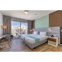 4-Star Malta Beach Holiday: Hotel with Rooftop Pool & Flights Included
